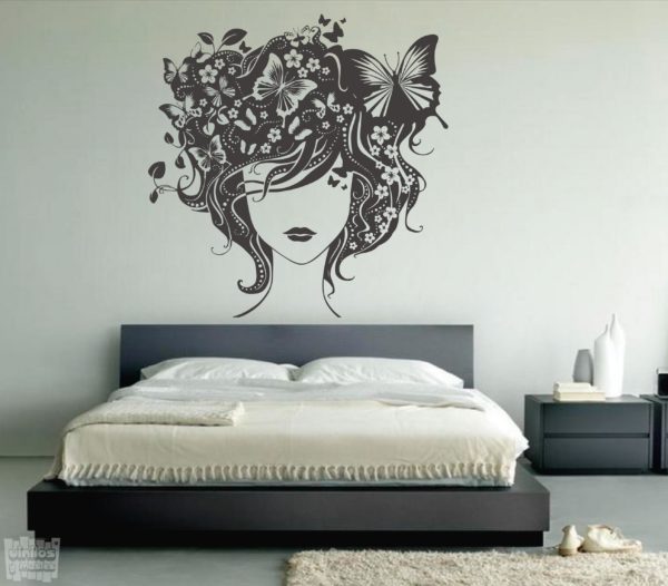 Vinilo decorativo silueta mujer floral mariposas.
